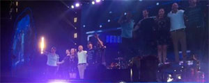 Coldplay on stage with RMVC members