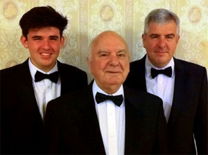 Gordon Williams – 69 years a member of Rhos Male Voice Choir – with son Kevin and grandson Gruffydd.